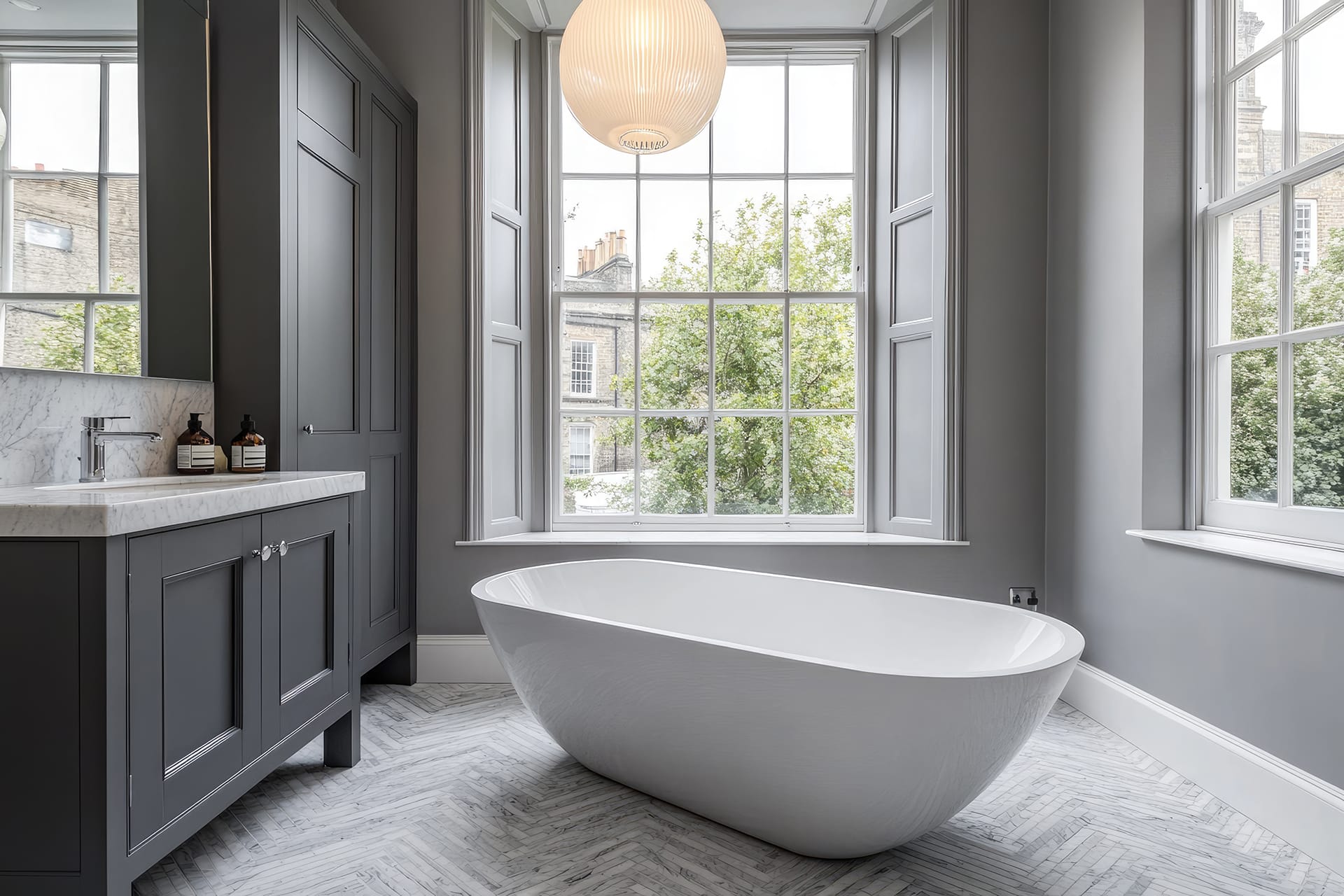 Modern freestanding bathtub, grey bathroom, London view, herringbone floor, home design